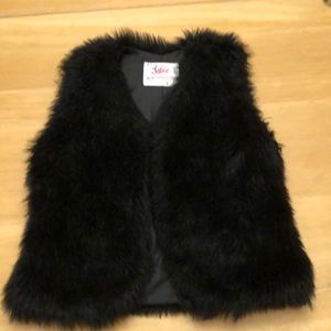 Justice black faux fur vest